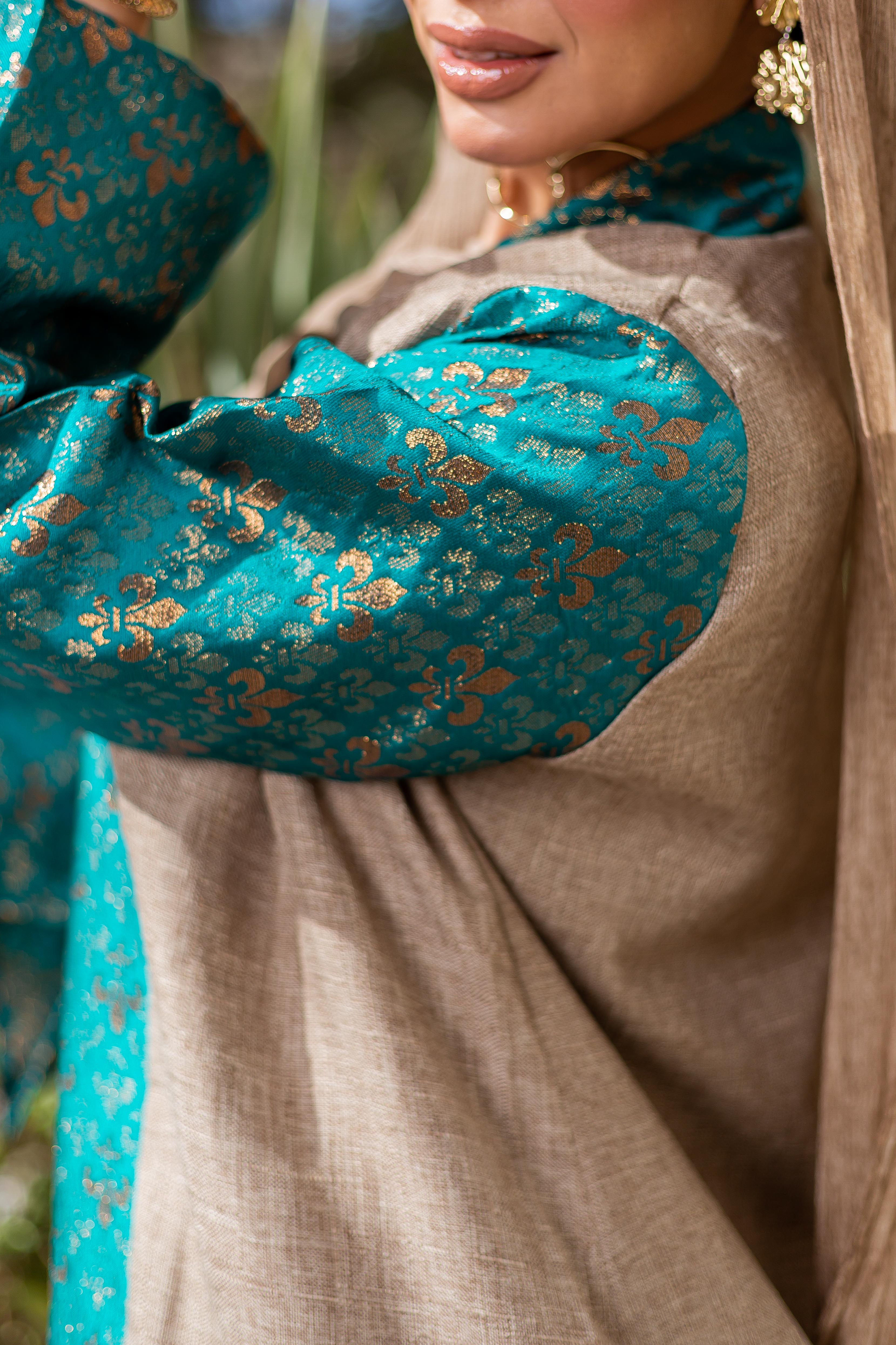 Debaj Turquoise Indian Kaftan showing fabric, fit, and styling details
