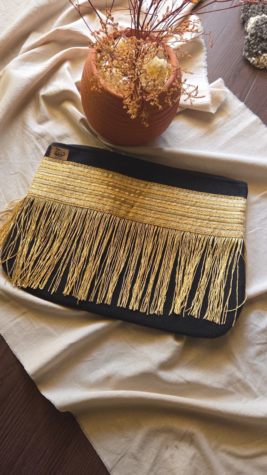 Clutch by Debaj, elegant women’s accessory